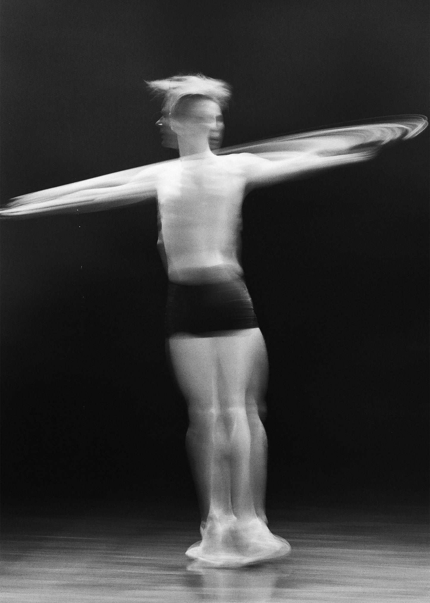black and white image of male in spinning motion. PRP (platelet-rich plasma) anti-ageing treatment. Aesthetic Treatments at Teresa Tarmey