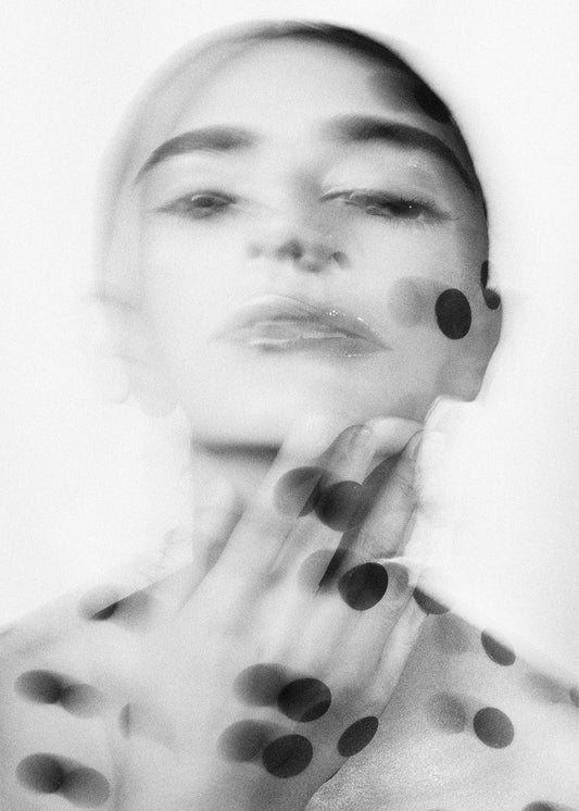 Arty black and white image of a woman covered in black spots. Rejuvenation Mega Boost. Targeted Treatments at Teresa Tarmey