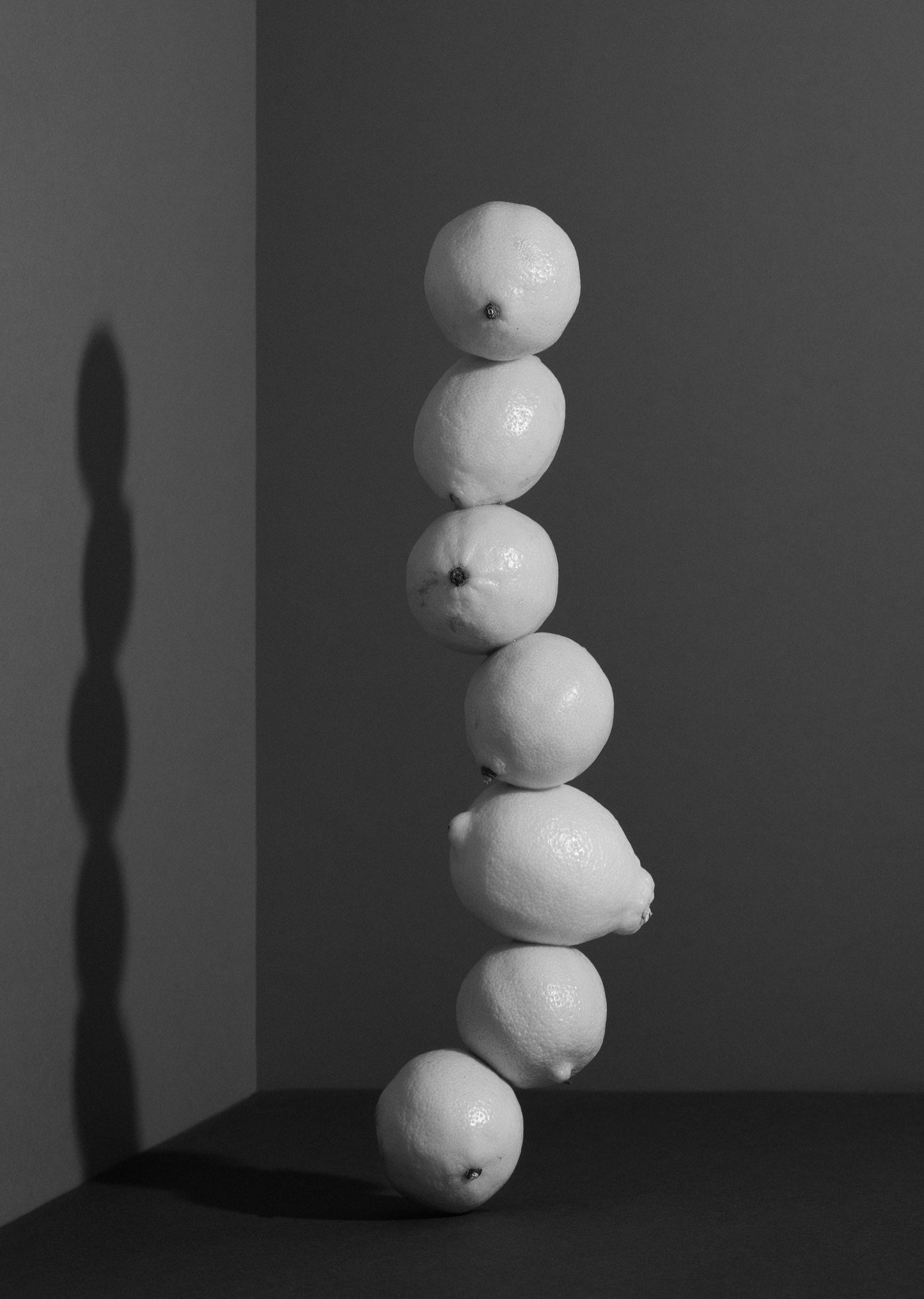 Aleksandar Pasaric Photography - Seven lemons balancing on top of each other. Vitamin C Drip.  IV Drips at Teresa Tarmey